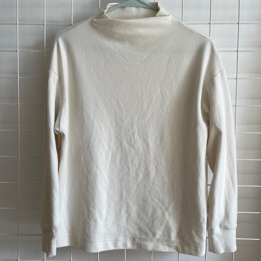 Uniqlo mock neck cream colored long sleeve
